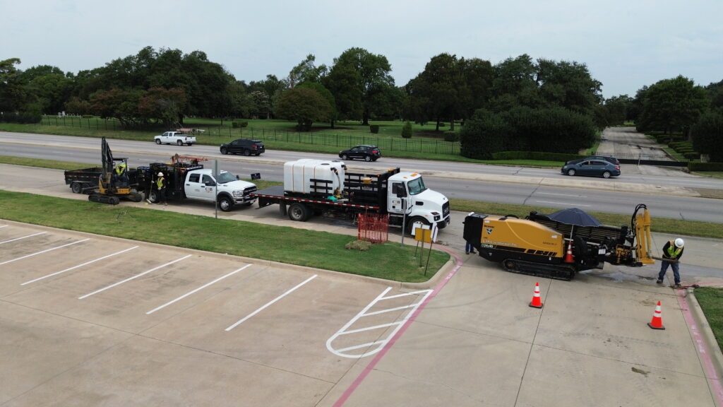 HDD rig installing fiber conduit to elementary school in Dallas